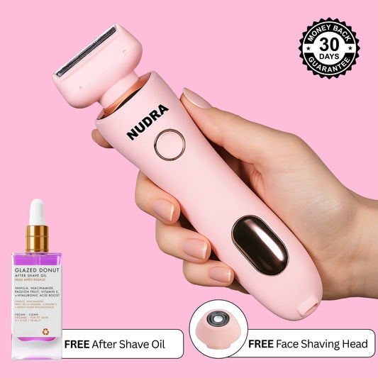 SleekGlide Pro™ electronic shaver in hand, featured with after shave oil and face shaving head, showcasing skin-safe design.
