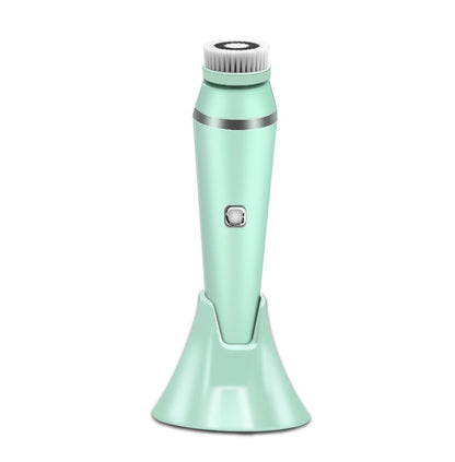 Facial Cleansing Brush in mint color placed on a stand for easy access and storage.